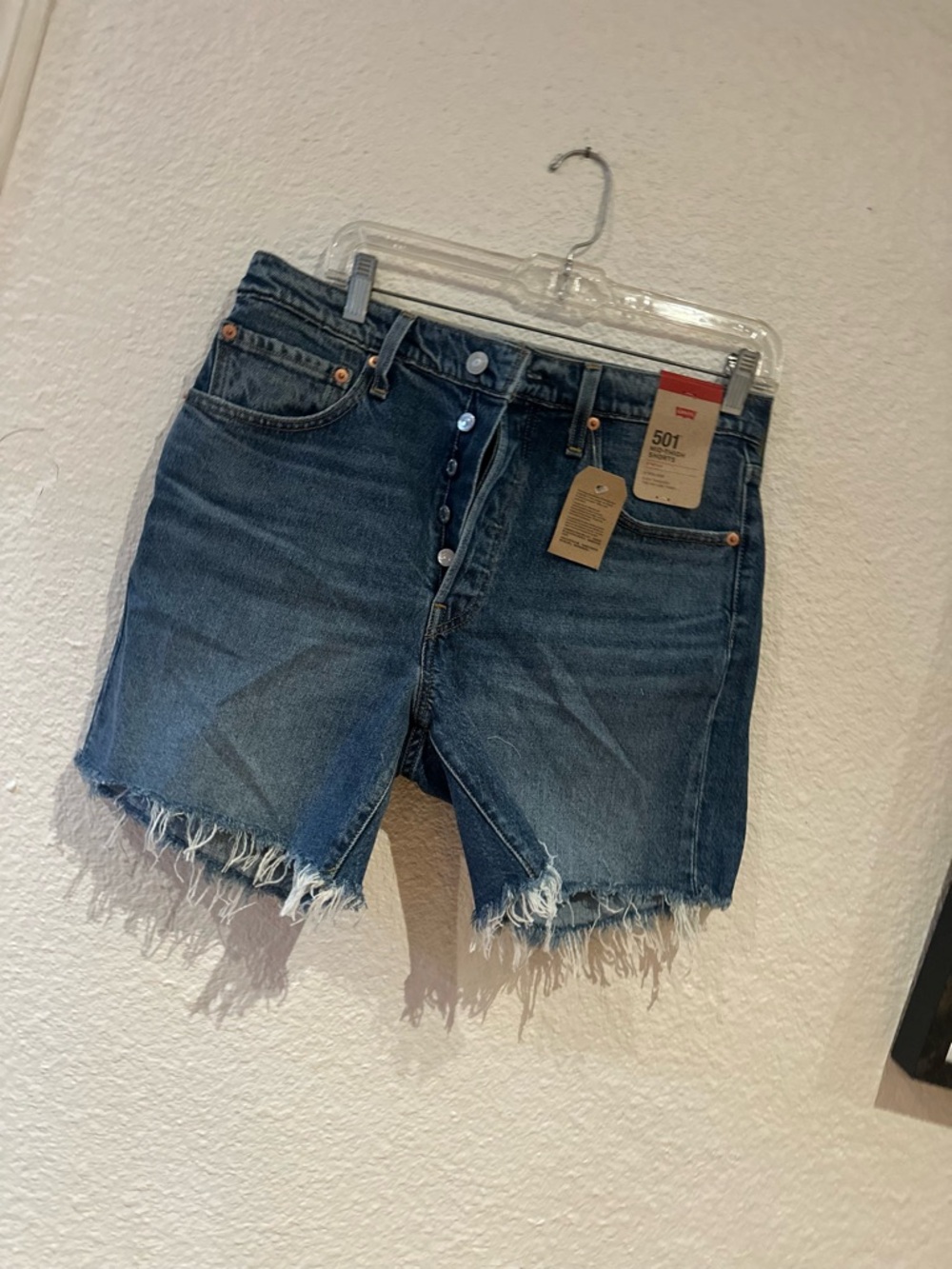 Levi's Denim Cutoff Jean Shorts in Medium Blue Wash mid thigh style (30)